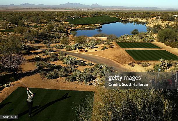 Henrik Stenson of Sweden hits his tee shot on the fourth hole during the fourth round of the WGC-Accenture Match Play Championships on February 24,...