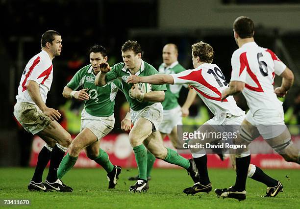 Gordon D'Arcy of Ireland bursts through the England defence during the RBS Six Nations Championship match between Ireland and England at Croke Park...