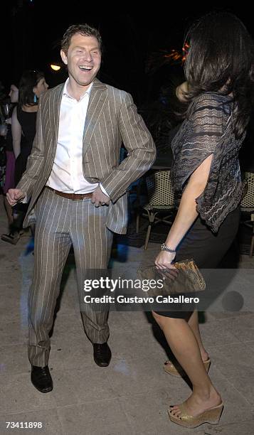 Bobby Flay dances at Hotel Victor at a party hosted by The William Morris Agency on February 23, 2007 in Miami Beach, Florida.