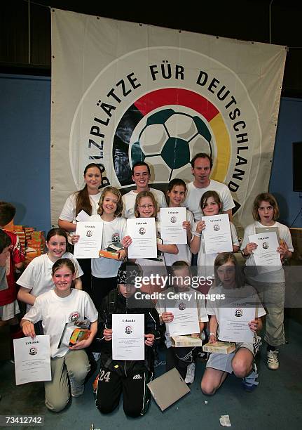Children play soccer during the 'Play Soccer, Get Together' charity tournament sponsored by Bitburger on February 24, 2007 in Munich, Germany.