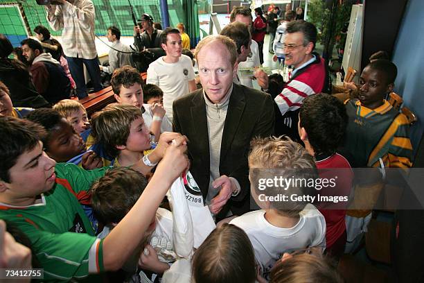 Matthias Sammer and Children during the 'Play Soccer, Get Together' charity tournament sponsored by Bitburger on February 24, 2007 in Munich, Germany.