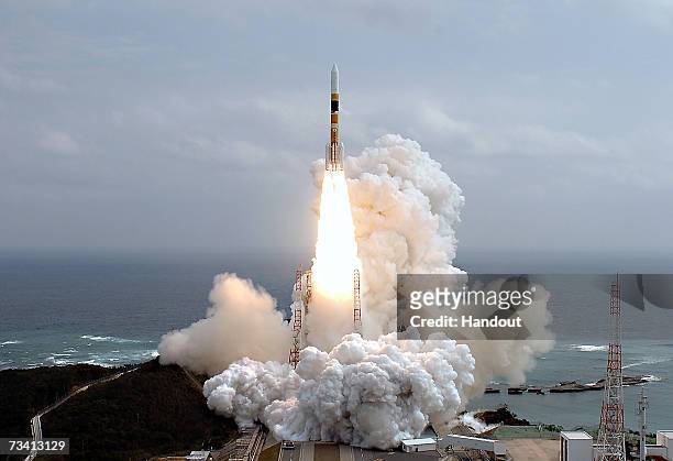 Japan's H2-A rocket launches from a launching pad at the Tanegashima Space Center on February 24, 2007 in Kagoshima Prefecture, Japan. Onboard the...