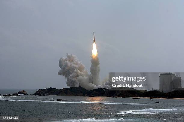 Japan's H2-A rocket launches from a launching pad at the Tanegashima Space Center on February 24, 2007 in Kagoshima Prefecture, Japan. Onboard the...