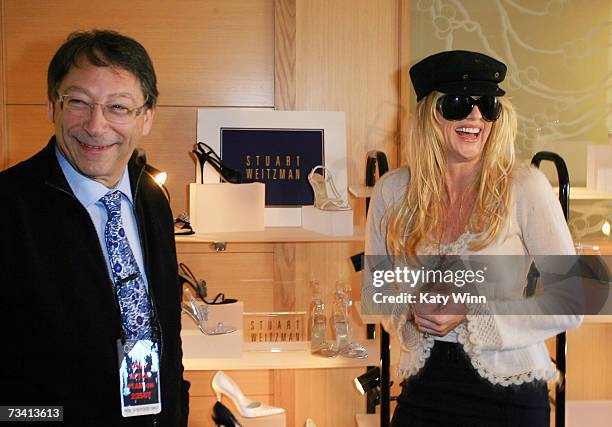 Actress Nicolette Sheridan and Stuart Weitzman attend The Stuart Weitzman luxury suite showcasing an exclusive Oscar shoe collection; skin care...