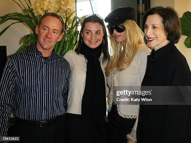 Jar Laird, Jacki Giusti, actress Nicolette Sheridan and Jane Weitzman attend The Stuart Weitzman luxury suite showcasing an exclusive Oscar shoe...