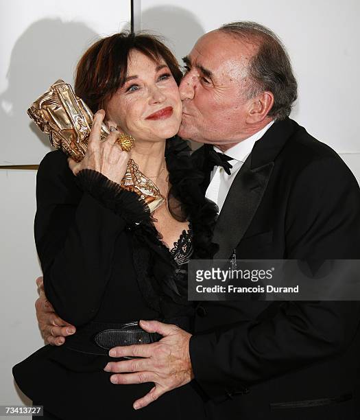 Marlene Jobert poses with Claude Brasseur during a photo call at the 32nd Cesars film awards ceremony on February 24, 2007 in Paris, France.