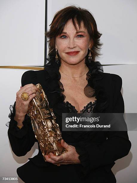 Marlene Jobert poses with her honorary achievement award during a photo call at the 32nd Cesars film awards ceremony on February 24, 2007 in Paris,...