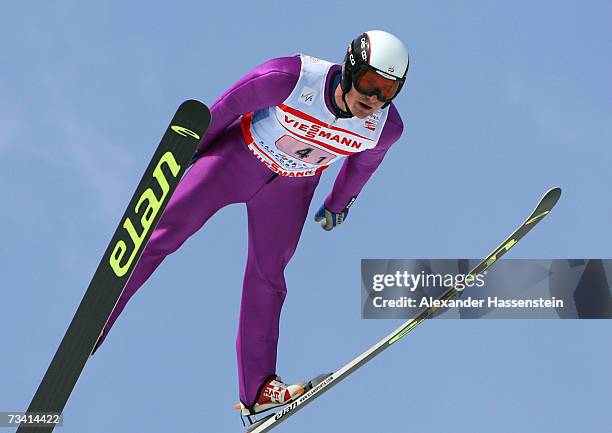 Bryan Fletcher of the U.S. Soars trough the air in the Jumping of the Nordic Combined Team Event during the FIS Nordic World Ski Championships 2007...