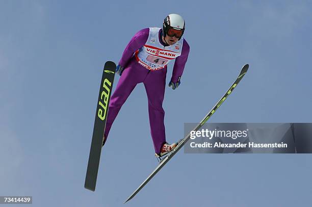 Bryan Fletcher of the U.S. Soars trough the air in the Jumping of the Nordic Combined Team Event during the FIS Nordic World Ski Championships 2007...