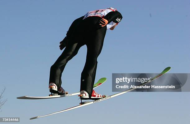 Ronny Ackermann of Germany soars trough the air in the Jumping of the Nordic Combined Team Event during the FIS Nordic World Ski Championships 2007...