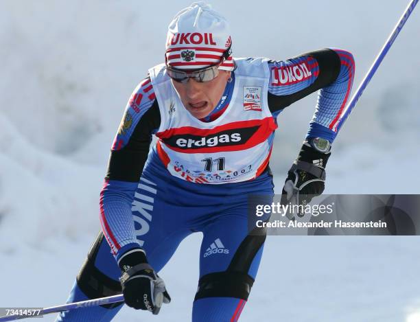 Olga Savialova of Russia wins the Women Cross Country Pursuit 15 km Classic and Free Event during the FIS Nordic World Ski Championships 2007 on...
