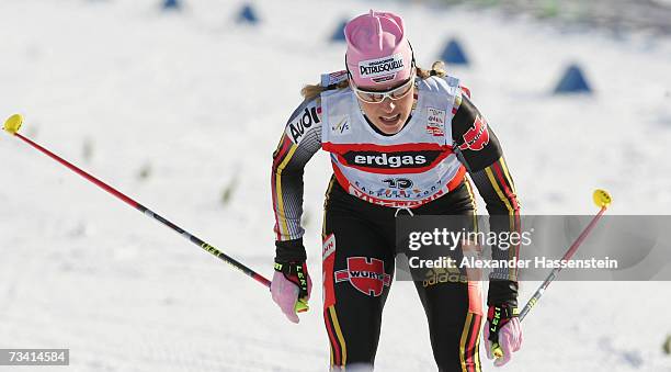 Evi Sachenbacher Stehle of Germany reacts after the Women Cross Country Pursuit 15 km Classic and Free Event during the FIS Nordic World Ski...