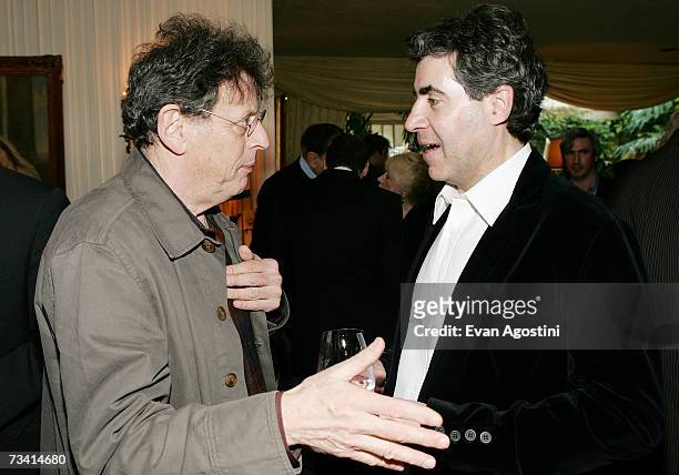 Oscar nominated music composers Philip Glass and composer Javier Navarrete chat during the Society of Composers & Lyricists annual champagne...