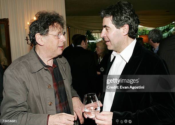 Oscar nominated music composers Philip Glass and composer Javier Navarrete chat during the Society of Composers & Lyricists annual champagne...