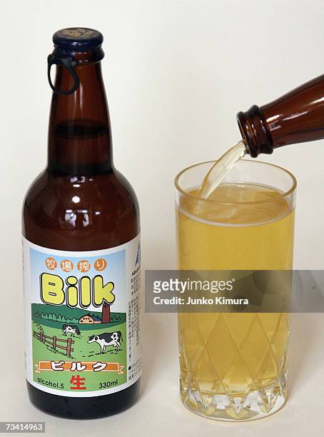 In this photo illustration Bilk, a beer made from milk, is poured into a glass on February 25, 2007 in Tokyo, Japan. A liquor shop named Nakahara, on...