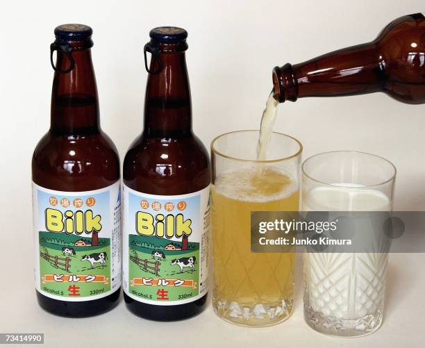 In this photo illustration Bilk, a beer made from milk is poured into a glass next to a glass of milk on February 25, 2007 in Tokyo, Japan. A liquor...