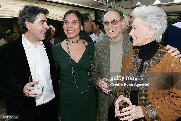 Oscar nominated music composers Javier Navarrete and wife Alma chat with Oscar-winning lyricist Hal David and his wife Eunice at the Society of...