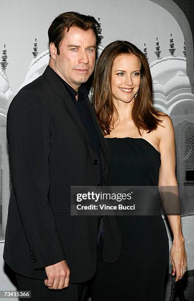 Actor John Travolta and wife Kelly Preston attend "Giorgio Armani Celebrates the Oscars" with an exclusive fashion show of the Armani Prive...