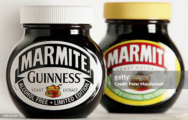 In this photo illustration, A jar of Marmite spread sits with a Guinness special edition version on February 25, 2007 in London. The special Guinness...
