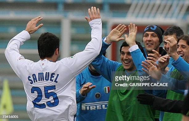 Inter's defender Walter Samuel of Argentina celebrates with temmates after scoring against Catania during their Serie A match at "Manuzzi" Stadium in...