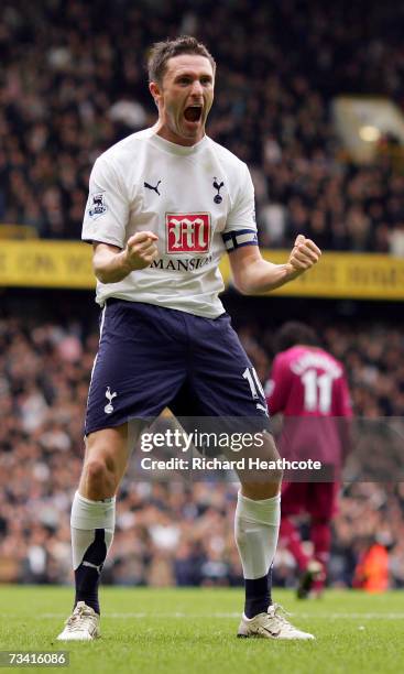 Robbie Keane of Tottenham Hotspur celebrates scoring the third goal during the Barclays Premiership match between and Tottenham Hotspur and Bolton...