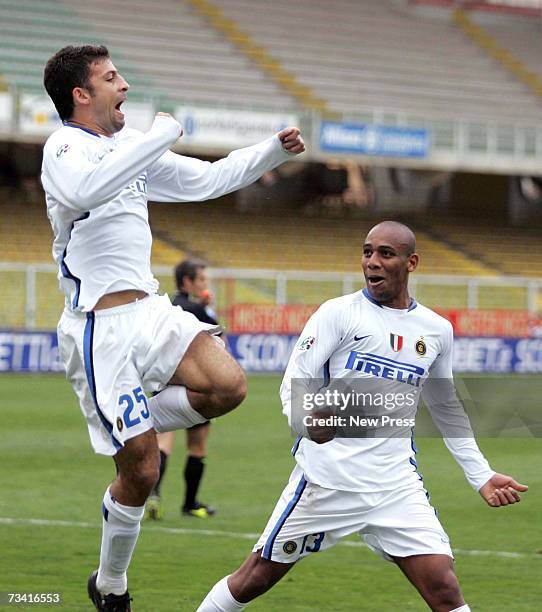 Walter Samuel of Inter Milan celebrates his goal with team mate Sisenado Maicon during the Serie A match between Catania v Inter Milan at the Angelo...