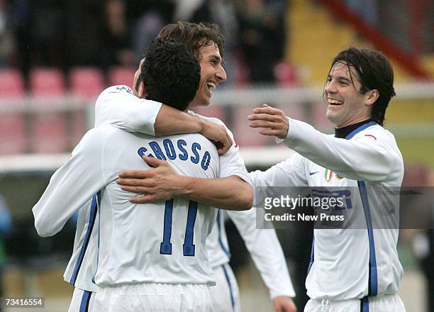 Fabio Grosso of Inter Milan celebrates his goal with team mates Zlatan Ibrahimovic and Santiago Solari during the Serie A match between Catania v...
