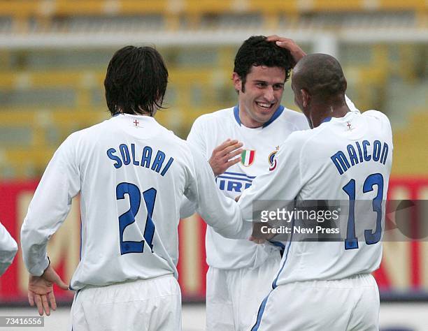 Fabio Grosso of Inter Milan celebrates his goal with team mates Sisenado Maicon and Santiago Solari during the Serie A match between Catania v Inter...