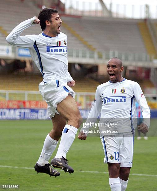 Walter Samuel of Inter Milan celebrates his goal with team mate Sisenado Maicon during the Serie A match between Catania v Inter Milan at the Angelo...