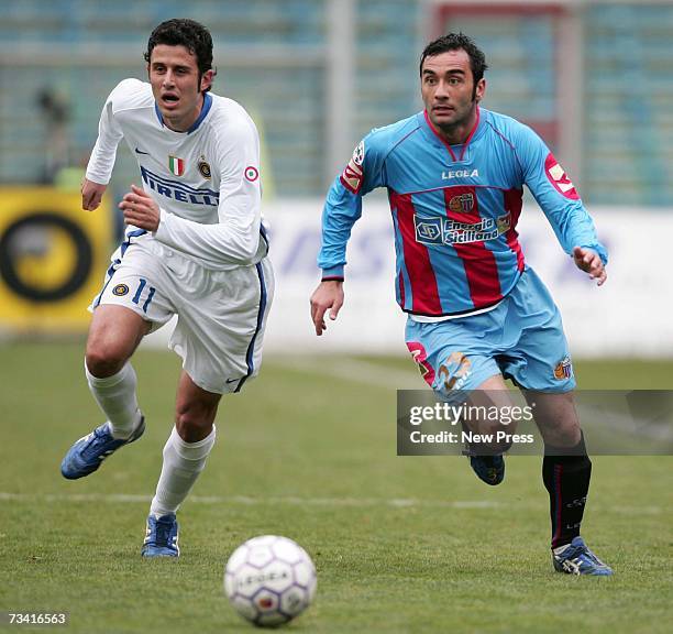Fabio Grosso of Inter Milan and Giuseppe Colucci of Catania in action during the Serie A match between Catania v Inter Milan at the Angelo Massimino...