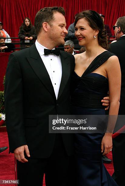 Actor Peter Sarsgaard and wife Maggie Gyllenhaal attend the 79th Annual Academy Awards held at the Kodak Theatre on February 25, 2007 in Hollywood,...