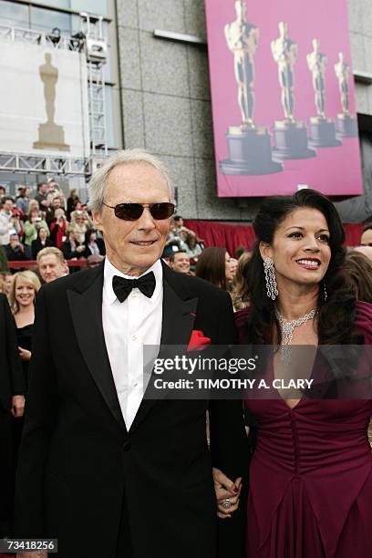 Hollywood, UNITED STATES: Clint Eastwood, nominee for Best Director for his work on "Letters from Iwo Jima," and wife Dina Eastwood arrive at the...