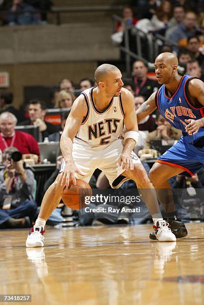 Jason Kidd of the New Jersey Nets with the ball against Stephon Marbury of the New York Knicks on February 25, 2007 at the Continental Airlines Arena...