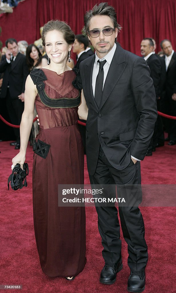 Robert Downey Jr and his wife Susan arri...