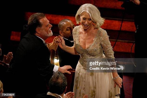Actress Helen Mirren with husband Taylor Hackford accepts the award for Best Leading Actress during the 79th Annual Academy Awards at the Kodak...