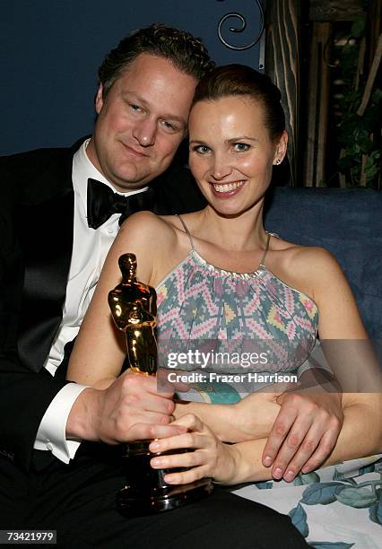 Director Florian Henckel von Donnersmarck poses with his award for Best Foreign Language Film and wife Christiane Asschenfeldt at the Governor's Ball...