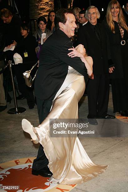 Actor James Woods and guest arrive at the 2007 Vanity Fair Oscar Party at Mortons on February 25, 2007 in West Hollywood, California.