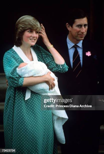 The Prince and Princess of Wales with their newborn son Prince William on the steps of St Mary's Hospital, London, June 1982.