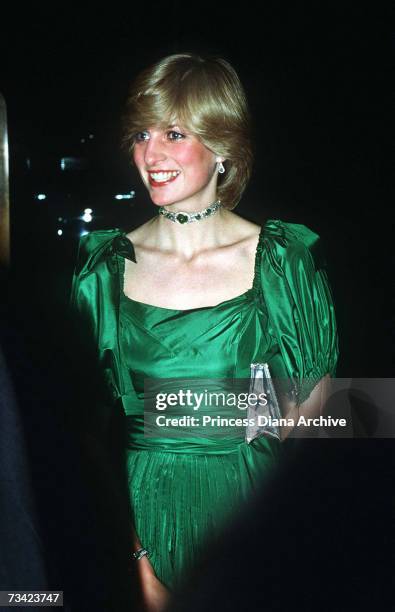 The Princess of Wales attends a charity concert at the Barbican, November 1982. She wears a green gown by Graham Wren.