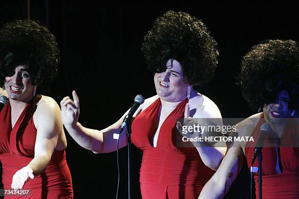 Hollywood, UNITED STATES: Performers Dan E Campbell , Chip Dornell and Glen Simon perform the opening number during the Razzie Awards in Hollywood,...