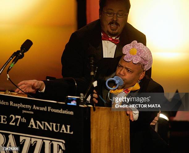 Hollywood, UNITED STATES: Presenter Chip Dornell introduces the Worst Picture Clip "Little Man" during the Razzie Awards in Hollywood, CA, 24...