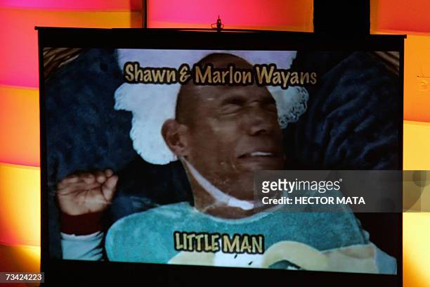 Hollywood, UNITED STATES: A clip of the winner for "Worst Actor", Marlon and Shawn Mayans for their movie "Little Man" is displayed during the Razzie...
