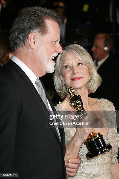 Director Taylor Hackford and british actress Helen Mirren, winner of best actress for leading role arrive at the 2007 Vanity Fair Oscar Party at...