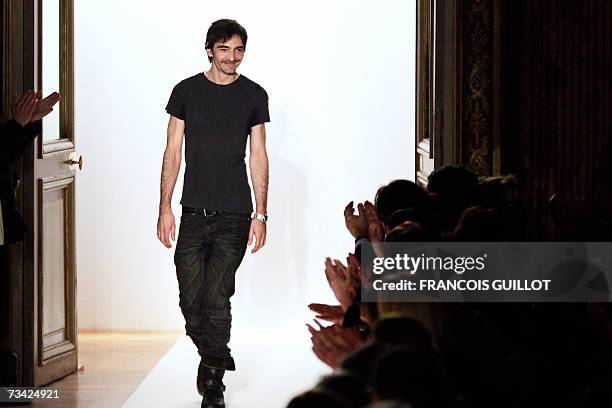Christophe Decarnin acknowledges the publi cat the end of the Autumn/Winter 2007/2008 ready-to-wear collection show for Balmain in Paris, 25 February...