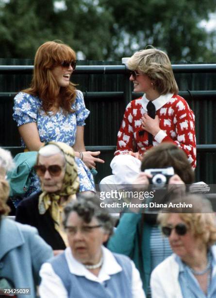 Princess Diana with Sarah Ferguson at the Guard's Polo Club, Windsor, June 1983. The Princess is wearing a jumper with a sheep motif from the London...