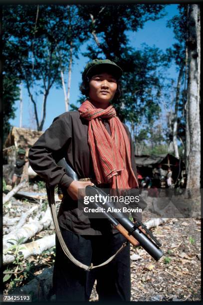 Khmer Rouge guerrilla, called a Mit Naree, armed with an Vietnam era American M-75 grenade launcher seen in the Chardanrom Mountains region of...