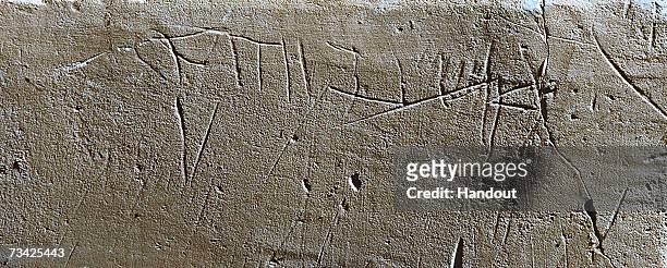 This photo provided by the Israeli Antiquities Authority on February 26 shows the inscription Yeshua Bar Yehosef engraved on a 1st century AD stone...