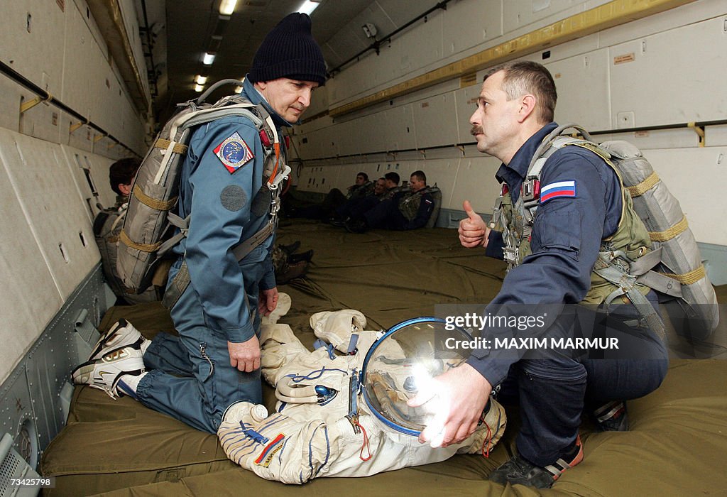 Russian instructor (R) speakes with form...