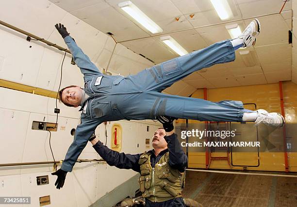 Former Microsoft software developer Charles Simonyi flies during a parabolic flight aboard a zero-gravity simulator, a Russian IL-76 MDK aircraft...