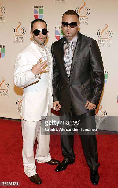 Music group Wisin y Yandel pose on the red carpet before Univision's Premio lo Nuestro Awards show on February 22, 2007 in Miami, Florida.